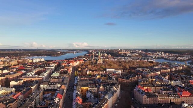 Stockholm, Sweden, aerial view of Sofia Church and the skyline of Stockholm and the archipelago, at sunset