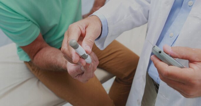 Testing doctor in white-labcoat checking patient in mint polo at exam couch with lancet, glucometer