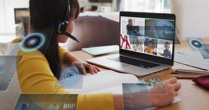 Taking notes child wearing yellow top and headset at home desk, with notebook and laptop overlays