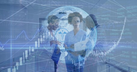 Discussing 3 staff in scrubs and lab coat reviewing data in hospital, with papers, caduceus, charts