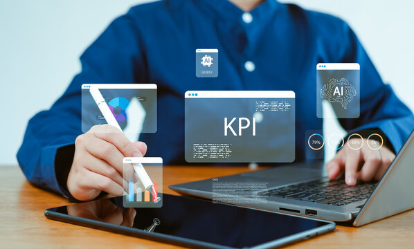 business professional analyzing KPI dashboards with AI-powered data insights on digital devices, showcasing performance metrics, analytics visualization, and modern business intelligence technology.