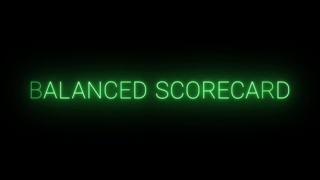 Flickering neon green Balanced scorecard sign animated on black background.
