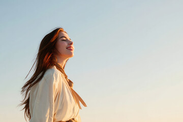 woman gazes upwards with tears in her eyes embodying mix of hope and longing