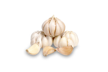 Fresh organic garlic bulbs and peeled cloves isolated