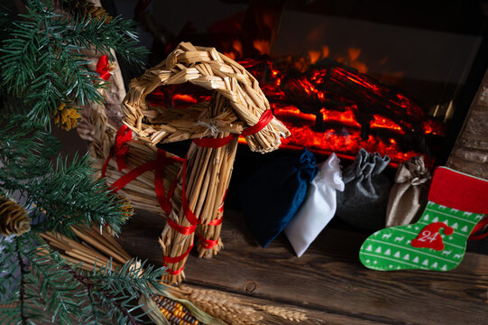 Scandinavian Straw Yule Goat and Advent Gift Bags by Cozy Christmas Fireplace
