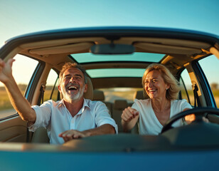 Mature couple driving in car with sunroof open, smiling and enjoying road trip. Man and woman in white clothes, laughing and happy. Joyful senior adults on journey together, having fun on road.