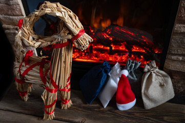 Scandinavian Straw Yule Goat and Advent Gift Bags by Cozy Christmas Fireplace