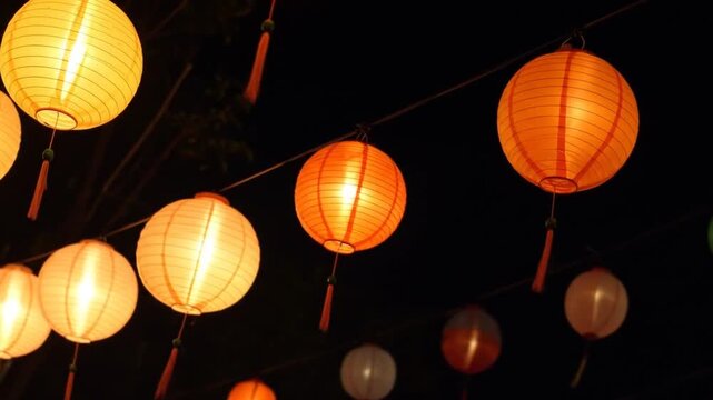 Glowing Lanterns: A Festive Nighttime Display of Asian Culture and Celebration
