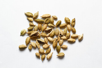 Cardamon pods in white background