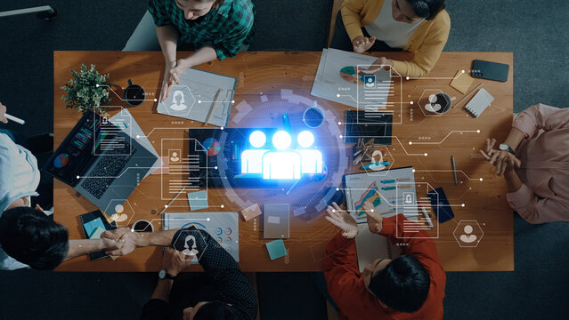 Concept of a digital human resources platform for workforce management. An applicant tracking system helps in team building by organizing employee and candidate profiles. Fermion - Powered by Adobe