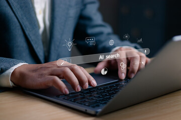 Concept Using AI search for information or search engine optimization ,SEO, Man hand tapping on virtual search bar while using laptop, show search for information with internet technology connection