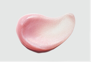 Sparkle micro glitter colored light pink lip gloss smudge swatch isolated on light neutral beige