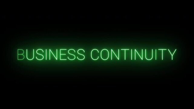 Flickering neon green Business continuity sign animated on black background.
