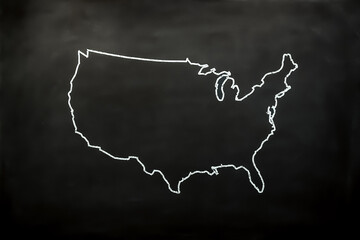 chalk outline of the United States map on a black chalkboard. geography design element with copy space.