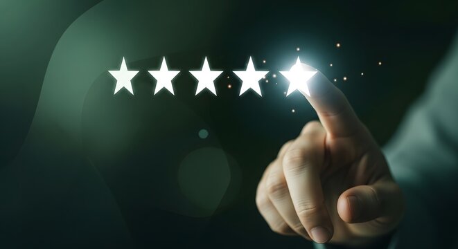 Customer hand touching a glowing five star rating on a dark background