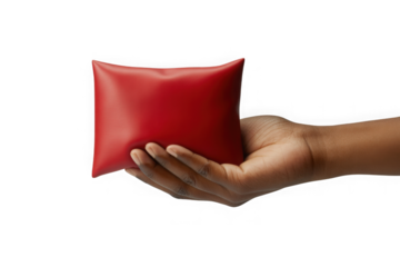 Hand holding small red rectangular soft cushion on isolated background isolated on transparent background