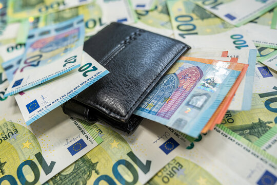 Euro cash and wallet symbol of wealth and economic balance