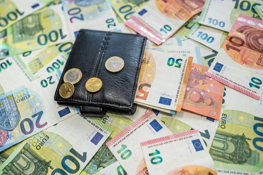 Euro cash and coins symbol of european currency and economy