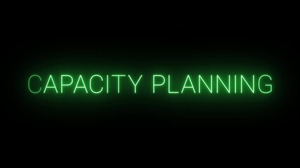 Flickering neon green Capacity planning sign animated on black background.
