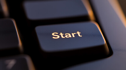 Close up of a computer keyboard key labeled 'Start' illuminated in a soft glow, inviting users to begin. Represents the beginning of a digital journey or process.
