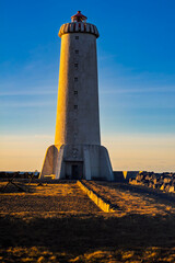 Lighthouse at Sunset on the Iceland Coast