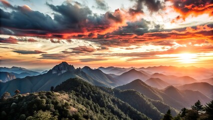 Obraz premium Mountains under a sunset sky