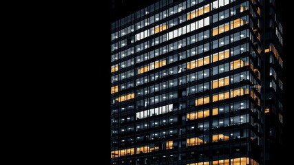 Modern skyscraper illuminated at night showcasing architectural beauty and urban lifestyle - Powered by Adobe