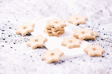 Christmas cookies on bright background. Soft focus. Close up	