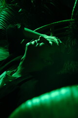 Portrait of DJ immersed in latenight contemplative mood