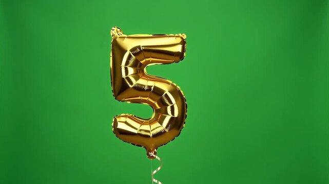 Golden foil balloon number 5 flying animation on green screen, isolated birthday or anniversary celebration element with chroma key background.