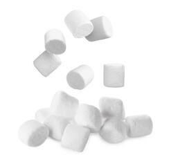 Fresh mallows falling onto heap on white background