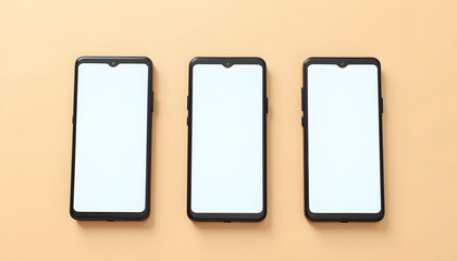Three smartphones with blank screens on a neutral background