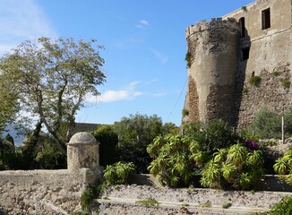 Tower, walls and garden at the top of Aragonese Castle on the island of Ischia, Italy