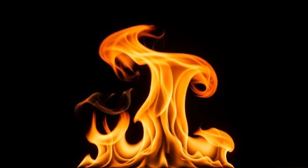 Vibrant orange flames dancing against a deep black background