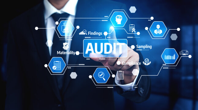 A businessman in a suit interacts with a digital screen featuring audit icons, symbolizing data analysis and compliance in corporate finance and management. Tessel - Powered by Adobe