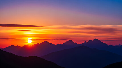 Beautiful sunset over the mountains with colorful clouds in sky