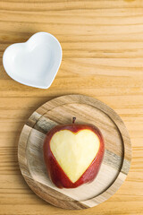 Detail of apple with carved heart