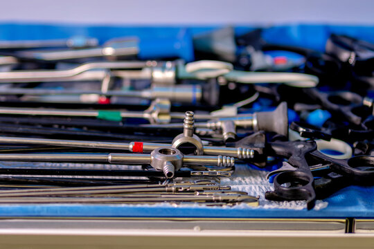 A bunch of surgical instruments sitting on top of a table