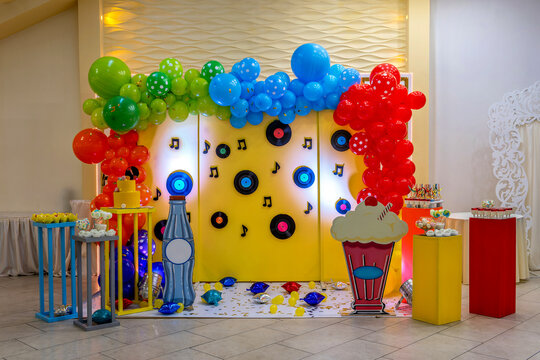 A colorful birthday party with balloons and decorations