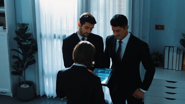 Top view of smart manager shaking hand with diverse team and analyze financial data from tablet. Skilled female leader joining the group making a deal and sharing marketing strategy. Directorate. - Powered by Adobe