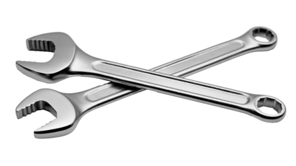Two modern silver wrenches crossed, essential tools for repair, construction and home improvement projects