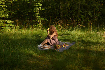 Woman relaxes amid nature, Calm female reader rests in sunny field