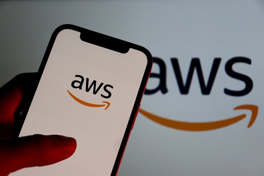 AWS logo on smartphone screen. AWS (Amazon Web Services). 