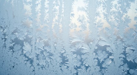 Close up of ice flowers on a window in winter, creating a beautiful pattern