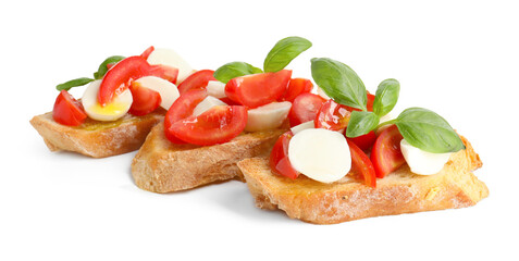 Tasty bruschettas with mozzarella cheese, tomatoes and basil isolated on white