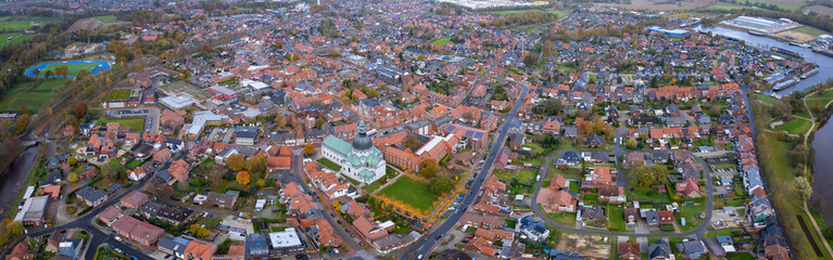 Obraz premium An aerial panorama view above the old town of the city Haren (Ems), 49733 on an early summer morning in Germany