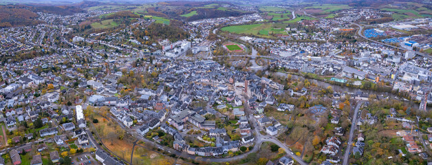 An aerial panorama view above the old town of the city Wetzlar on an early summer morning in Germany