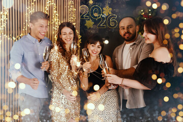 Happy New Year 2026 greeting card, bokeh lights. Friends celebrating with sparklers and wine...