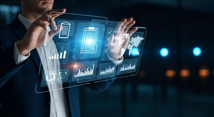 Man interacting with transparent futuristic interface displaying data