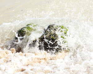 Water Splashing a Rock